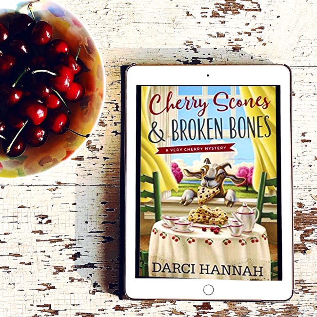 BOOK REVIEW: Cherry Scones and Broken Bones by Darci Hannah @midnightinkbook @kayepublicity #cherrysconesandbrokenbones #cozymystery
