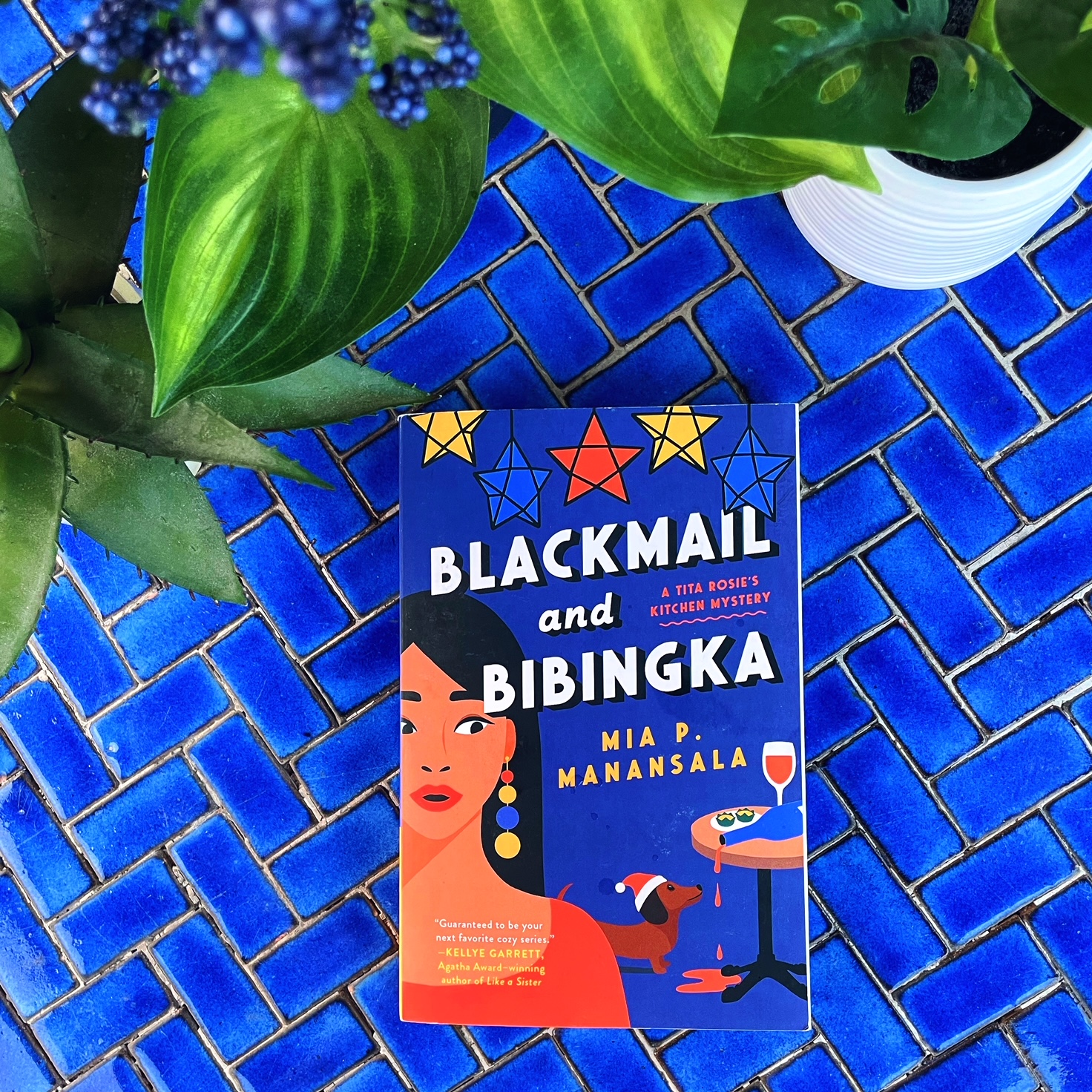 Cozy Mystery Review: Blackmail and Bibingka | Mia P Manansala | Tita Rosie’s Kitchen Mystery #3