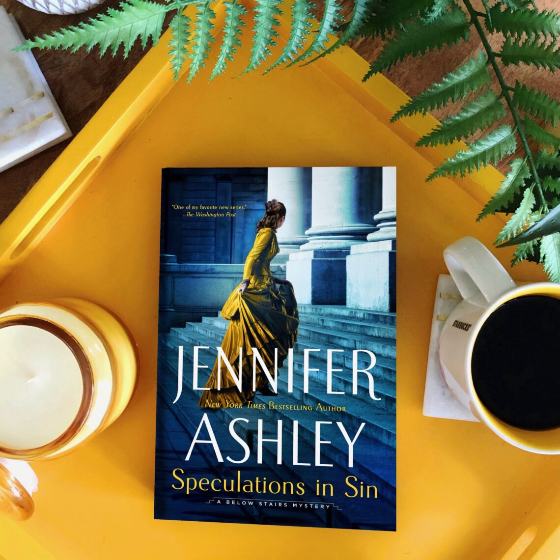 Speculations in Sin is an historical mystery set in the victorian era that shows a cook and single mother Kat Holloway running up the stairs of a bank where she is investigating embezzlement.