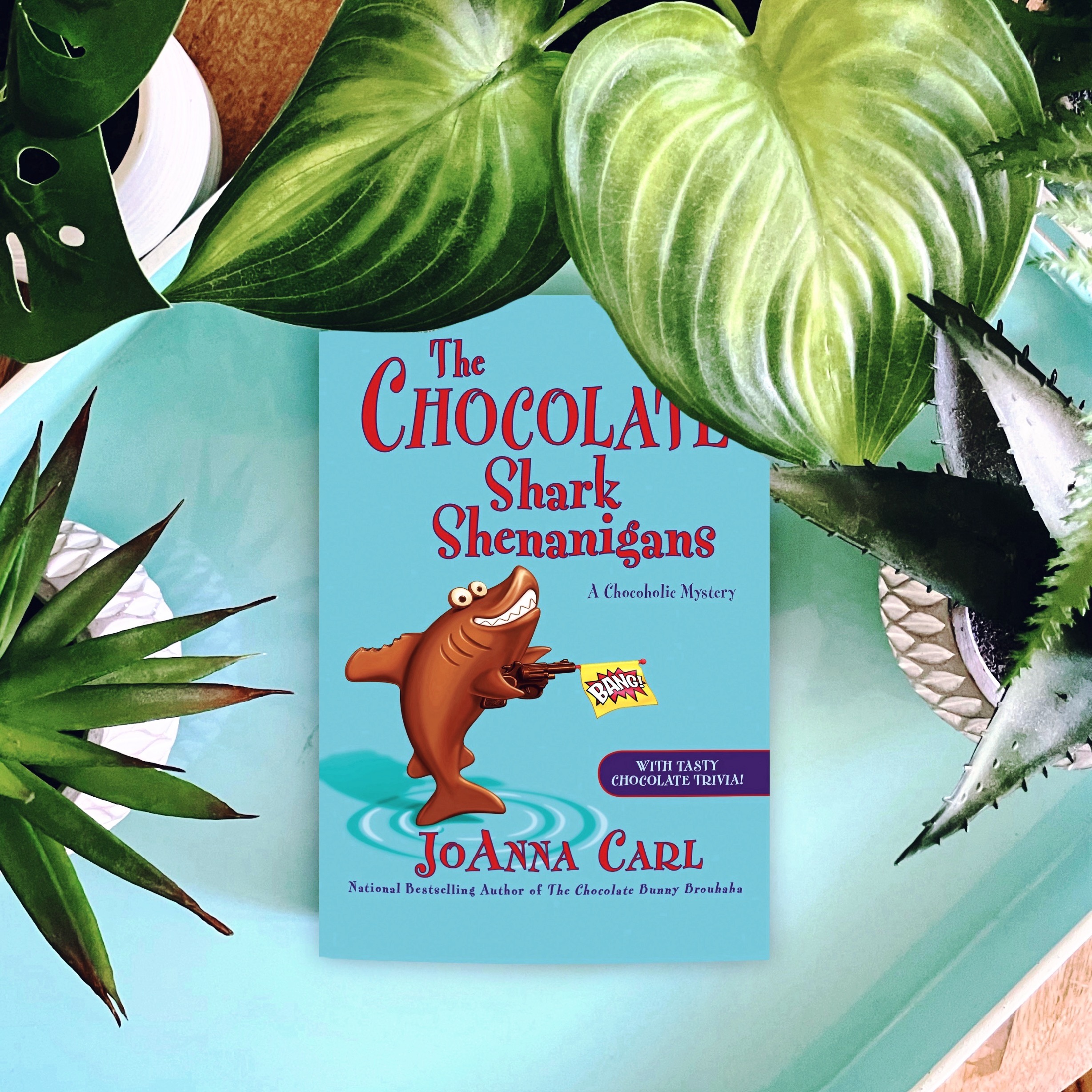 Cozy Mystery Review: The Chocolate Shark Shenanigans | Joanna Carl