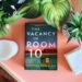 The Vacancy in Room 10 by Seraphina Nova Glass shows a gritty motel on the cover with a lit vacancy sign and dark shadows
