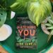 Watching You is a gripping psychological thriller by Lisa Jewell with a great twist. The cover is green and shows plants, and the book is on a green background.
